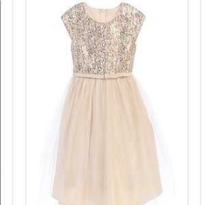 A sparkly, gold party dress for a little girl!